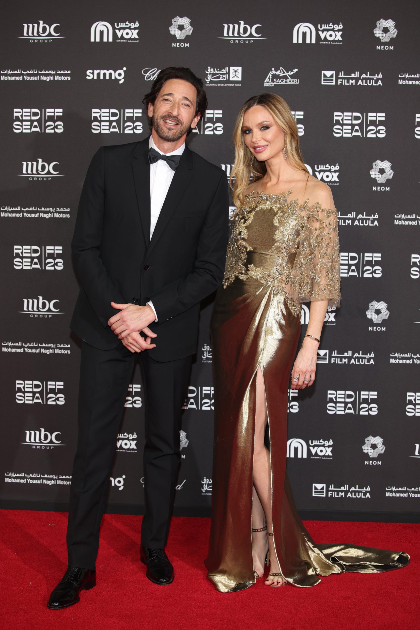 JEDDAH, SAUDI ARABIA - DECEMBER 07: Adrien Brody and Georgina Chapman attend the red carpet on the closing night of the Red Sea International Film Festival 2023 on December 07, 2023 in Jeddah, Saudi Arabia. (Photo by Daniele Venturelli/Getty Images for The Red Sea International Film Festival)